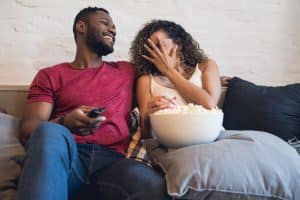young couple watchining the best hulu series to watch